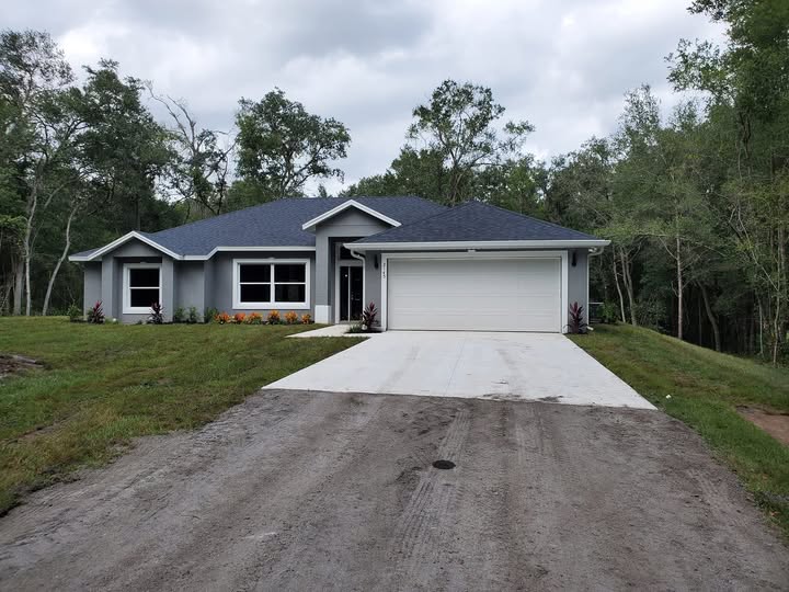 Countryside custom home with modern design by Elevation Builders Group in DeLand, Florida